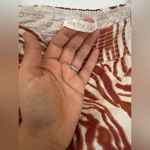 Anthropologie LOVE THE LABEL LOVE THE LABEL SMOCKED EYELET PUFF SLEEVE BLOUSE Photo 4