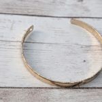 Almost A Brassy Shade of Gold Tone Cuff Bracelet Photo 5