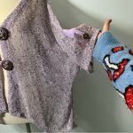 Vintage Purple knit cardigan with button detailing
Size 2x
Brand Kaktus Photo 5