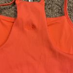 The North Face  Orange Ribbed Tank Top Photo 1