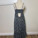 Free People  Molly Jo Midi Dress in a black floral print Photo 4