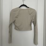 Alphalete  Cream Long Sleeve Crop Top Photo 1