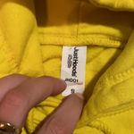 Urban Outfitters 1 800 LONELY YELLOW CAUTION FRAGILE HEART HOODIE Photo 2