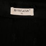 Elegant Black Button Photo 4