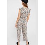 Free People  X Revolve Ruffle Your Feather Floral V-Neck Jumpsuit. Size S Photo 3