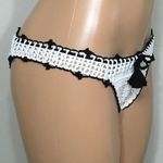 PilyQ white crochet bikini bottom with black trim. Large Photo 4
