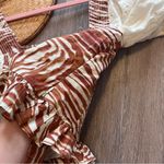 Anthropologie love the label zebra laser cut puff sleeve smocked blouse Photo 4