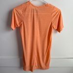 NWT 7MESH Industries Fuzzy Peach Elevate Short Sleeve Shirt Orange Size XS Photo 1