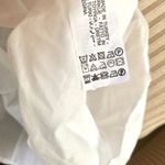 ZARA  V-neck Long Voluminous Abstract Printed Tiered Dress in White/Black Photo 8