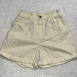 H&M  women's medium elastic waist shorts light yellow with pockets rolled hem Photo 0