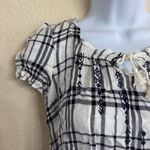 Black and White Smocked Blouse with Cap Sleeves and Rounded Neckline Size M Photo 4