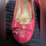 Coach Women's Pink Bow Flats. . Preloved Photo 2
