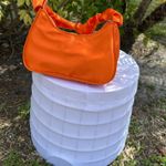 Vibrant Orange Crescent Shoulder Bag with Compact Design Photo 0