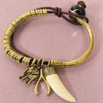 Bansri Lucky Charm Bracelet Gold Coil Leather Elephant, Wishbone & Tusk Pendant Brown Photo 0
