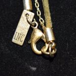 Source Unknown Vtg. INC Green Leather/Gold Tone Double Layer 5" Brown Stone Tassel 36" Necklace Photo 1