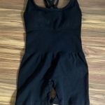 Black Strappy Back Athletic Romper Photo 0