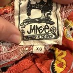 Jaase Orange and Yellow Floral Jumpsuit with V-Neck Photo 2