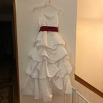 David's Bridal Wedding dress with a burgundy belt. Photo 4