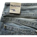 NWT--DENIM SHORTS-SIZE 13 /31 Wallflower luscious curvy fit stretch shorts, brand new, size 13 Measurements: Waist: side to side 18 inches Inseam: 3 inches Photo 6