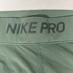 Nike PRO ATHLETIC LEGGINGS WITH SPARKLE MESH PANELS M OLIVE GREEN NEW A46 Photo 3