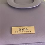 Trina Turk double handle tote in lilac with a removable crossbody strap Photo 9