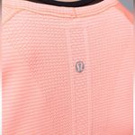 Lululemon Run: Swiftly Tech V Neck
Heathered Very Light Flare Photo 1