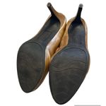 Christian Sirianio Gold Heels Photo 4