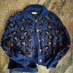 Moon River boutique belted animal print sweater Photo 0