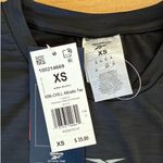 Reebok  - Chill Round Neck Short Sleeve Athletic Tee in Black Photo 1