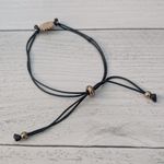 Black Adjustable Bracelet with Sunflower Charm Photo 4