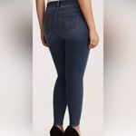 Torrid  Premimum Ultimate Stretch Jeggings jeans, size 18R in medium wash. Photo 1