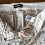 EXPRESS White and Black Plaid Flare Pants Photo 1