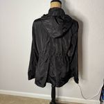 Torrid Black Nylon Rain Jacket Hooded Windbreaker Size 00 M Packable Adjustable Photo 9