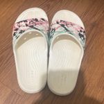 Crocs  Women’s Size 7 & Men’s Size 5 Floral Slide Sandals - Black, Pink, Green Photo 1