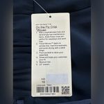 Lululemon On The Fly Crop *Woven 23"
True Navy size 10 Photo 5