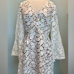 Monique Lhuillier  Lazercut Bell Sleeve fit and flare white dress size 10 Photo 3