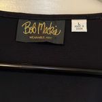 Bob Mackie wearable art in women’s size Large. Black with white sequins. GUC Photo 1