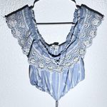 American Eagle Outfitters off-the-shoulder blouse in size Medium. Photo 0