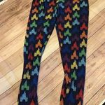 Disney Walt world fantasyland castle rainbow leggings medium Photo 0
