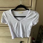 Olivia Rae Cropped White V Neck Photo 0