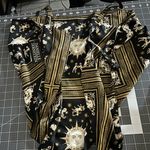 Danielle Bernstein  Black and Gold Zodiac Print Blouse Photo 5