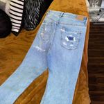 American Eagle Outffiters Distressed Mom Jean in Light Wash Photo 11