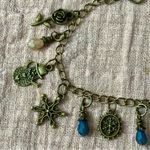 Charming Gold Bracelet with Blue and Cream Accents Photo 3