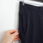 Nike  Womens Dri Fit Woven Bliss Mid Rise 7/8 Joggers Size XS Black Athleisure Photo 3