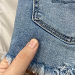 American Eagle  women's light wash curvy hi-rise shortie distressed ripped shorts Photo 4