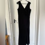Women’s Sleeveless Black Vneck ruched dress with front slit size Large Photo 1