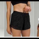 Lululemon  Hotty Hot Low Rise Short 4" in Le Tigre Camo Deep Coal Multi / Black Photo 1