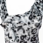 Sunny Leigh ✦ Cheetah Print Ruffle Top Photo 1