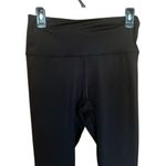 woman’s shiny black with Reebok on leg silver Leggings yoga workout Photo 2