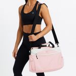 Champion Women's Pink and White Travel Bag Photo 0